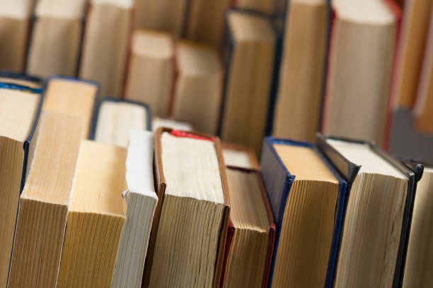 istock Old and used hardback books or text books from above. 1206936238