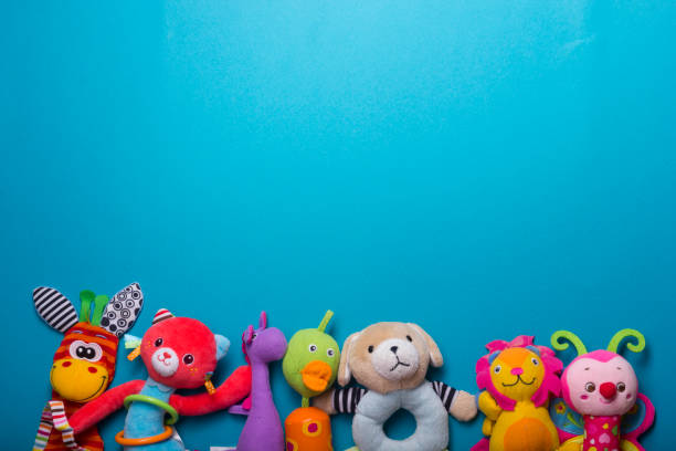 Kids educational developing toys frame on white background. Top view. Flat lay. Copy space for text.