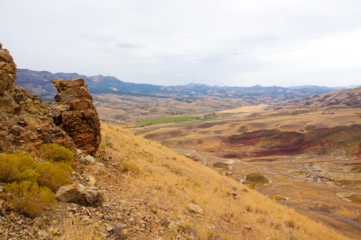 The Painted Hills National Monument has vibrant red hills in Eastern Oregon with fossil beds and historic significance.
