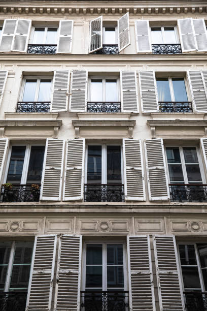 istock Paris Old Windows and Shutters - Parisian Architecture and Design Facade - Bright Symmetry 1206952837