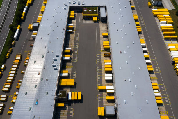 istock Aerial View of Cargo Containers and Distribution Warehouse 1206954083