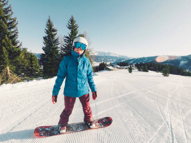 istock Woman snow boarding in Austria 1206955126