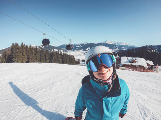 istock Smiling snow boarder ready for snow action 1206955132