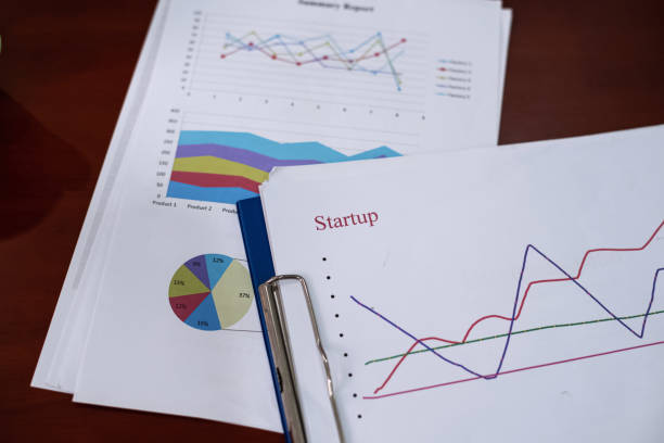 istock Business paper chart put on office desk,important data for new project. 1206959794