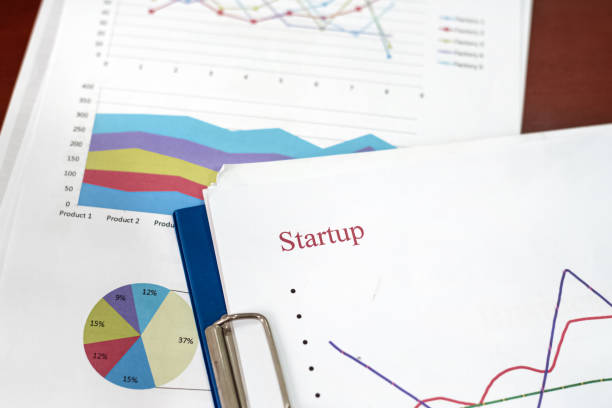 istock Business paper chart put on office desk,important data for new project. 1206959802