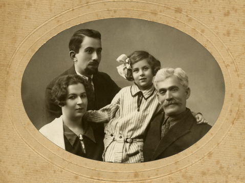 Family portrait, people of all ages, circa 1911.