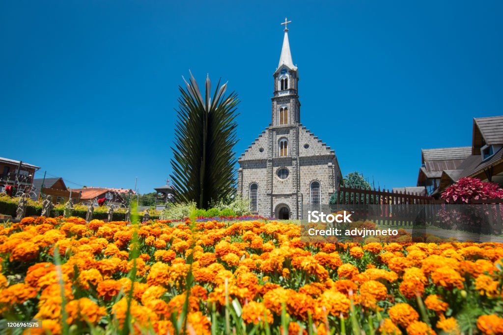 Parish São Pedro, Gramado Cathedral, Rio Grande do Sul, Brazil. St. Peter's Parish and its beautiful flowered garden. Gramado Cathedral, Rio Grande do Sul, Brazil. Gramado Stock Photo
