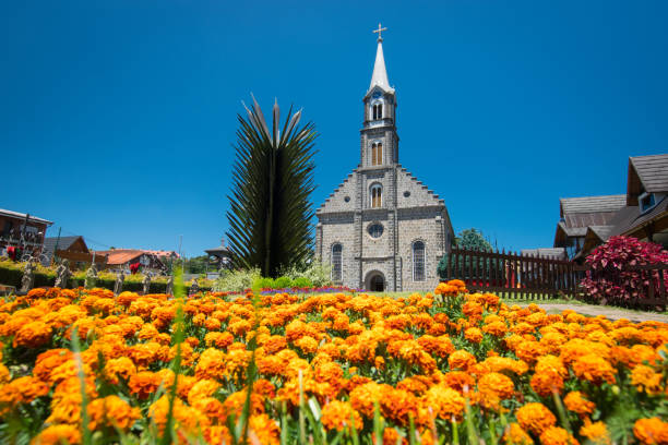 Parish São Pedro, Gramado Cathedral, Rio Grande do Sul, Brazil. St. Peter's Parish and its beautiful flowered garden. Gramado Cathedral, Rio Grande do Sul, Brazil. southern brazil photos stock pictures, royalty-free photos & images