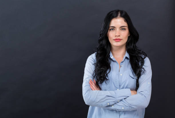 istock Young woman with crossed arms 1206970088