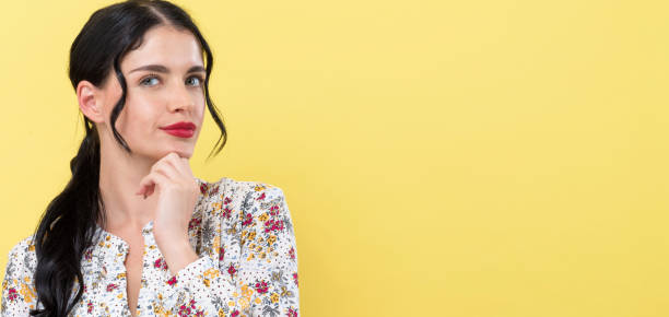 istock Young woman in a thoughtful pose 1206970249