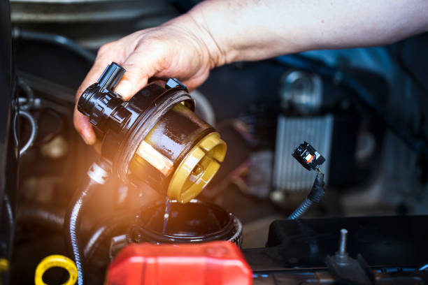 Fuel filter Car mechanic check the fuel filter at diesel engine. service or Preventive maintenance. filtration stock pictures, royalty-free photos & images