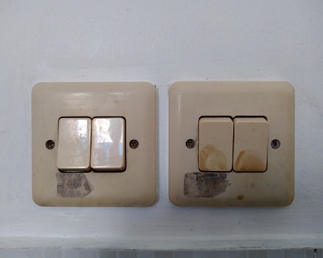 A GFCI outlet receptacle damaged by sugar ants. Ants and debris inside and outside of the outlet. Series of 5 photos showing damage.