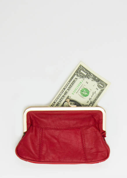 istock One dollar is in the red wallet. White background 1206979857