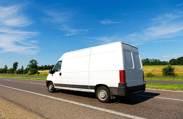 istock White Delivery Van  on the Road 120698087