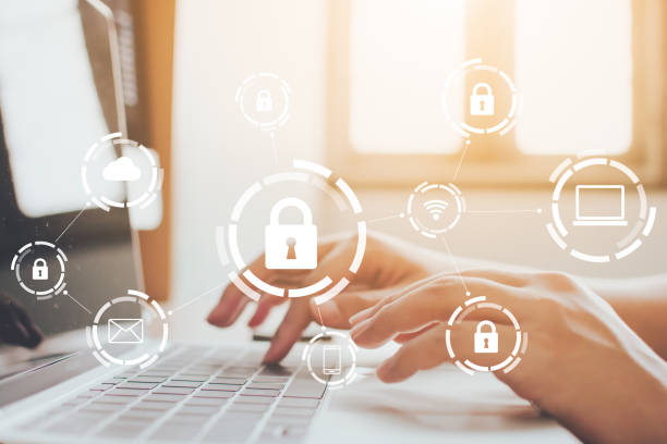 istock Businessman working on laptop. Protection network security computer and safe your data concept. Digital crime by an anonymous hacker 1206983388