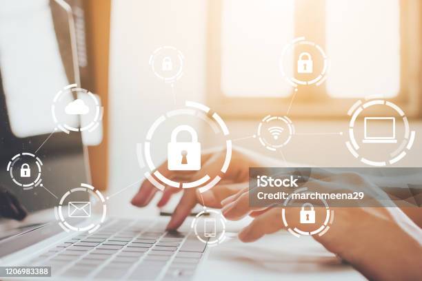 Businessman Working On Laptop Protection Network Security Computer And Safe Your Data Concept Digital Crime By An Anonymous Hacker Stock Photo - Download Image Now