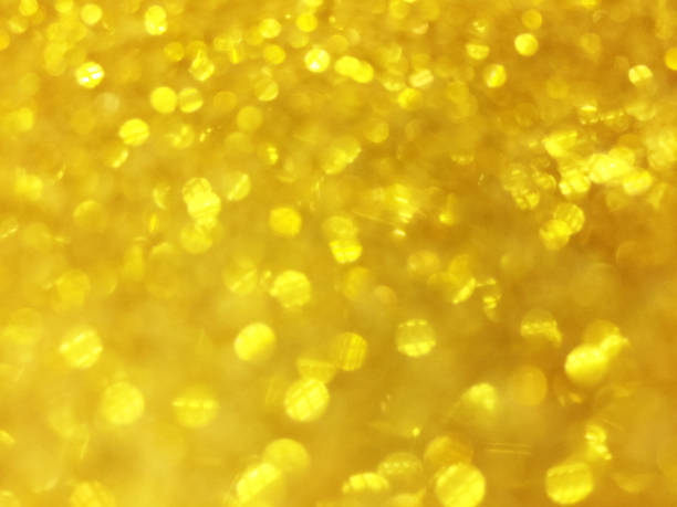 istock Abstract gold bokeh circles for christmas background, glitter light defocused and blurred bokeh 1206985439