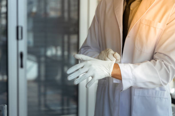 istock Scientist wearing a medical glove in laboratory. 1206985715