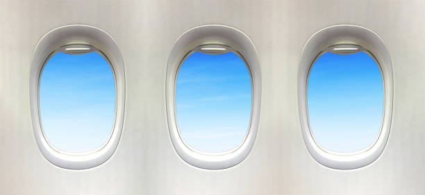 istock Airplane window and Fantastic soft white clouds against blue sky. 3 plane window 1206986501
