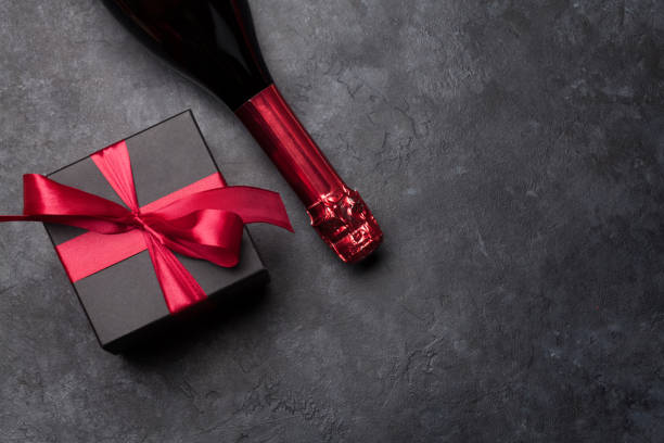 istock Valentines day card with champagne and gift box 1206987245