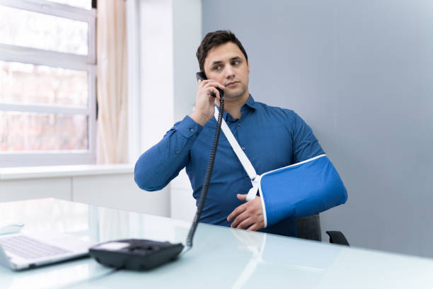 istock Disabled Businessman Calling On Phone 1206989424
