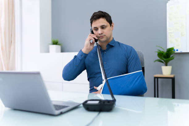 Disabled Businessman Calling On Phone