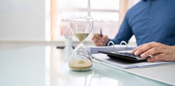 istock Sand Running Through The Bulbs Of An Hourglass 1206990202