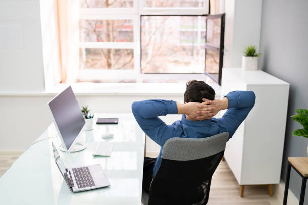 istock Businessman Relaxing On Chair 1206990282