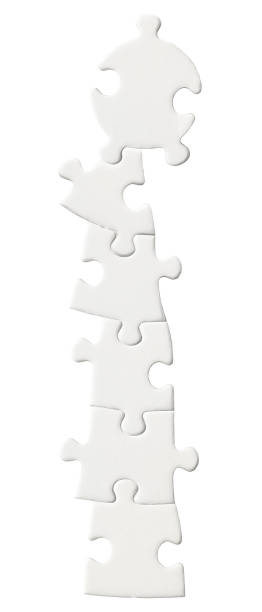 istock Isolated shot of blank jigsaw puzzle on white background 1206993077