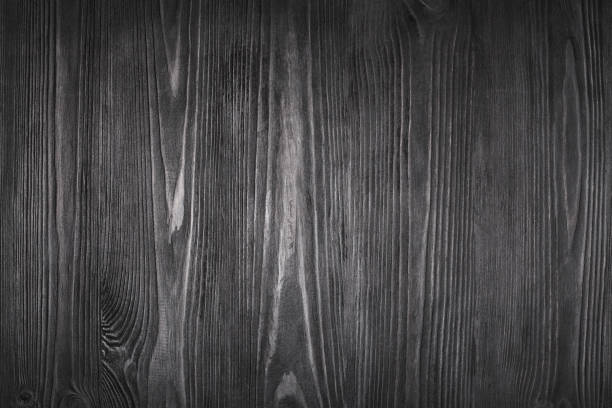 istock Black wooden background close up, dark gray wood texture backdrop, brown textured plank, empty grey natural board, timber structure surface pattern, monochrome decorative wallpaper, blank copy space 1206995083