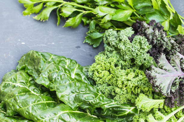 istock Green vegetables food collage. Kale, celery and chard. 1206997037