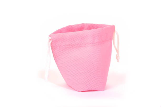 istock Texture of pink cloth bag isolated on white background. 1206999537