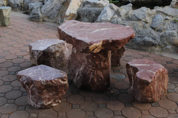 istock Table and chair made from natural stone. 1207000533