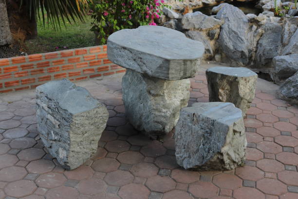 istock Table and chair made from natural stone. 1207000556