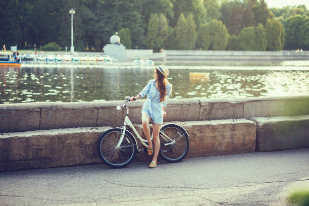 istock Romantic woman with vintage bicycle 1207000860