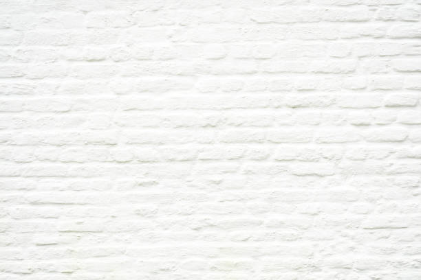 istock Background surface white wall brick vintage. Small brick block fabric as wall and paint in white color. 1207005845
