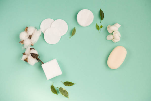 istock Cotton flowers with napkins to remove make-up, and handmade soap. 1207006559