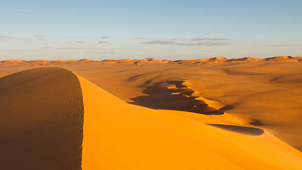 istock Sand Dunes at Sunset - Murzuq Desert, Sahara, Libya 120700798