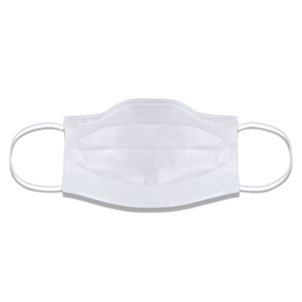 typical 3-ply medical mask isolated on white. hard lighted, harsh shadow. white surgical ear-loop mask. surgical mask with rubber ear straps to cover the mouth and nose. procedure mask from bacteria. - flu virus cold and flu swine flu epidemic imagens e fotografias de stock