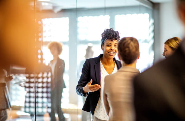 istock Business people at a conference event 1207011037