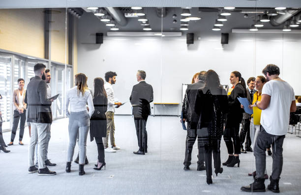 istock Business people at a conference event 1207011654