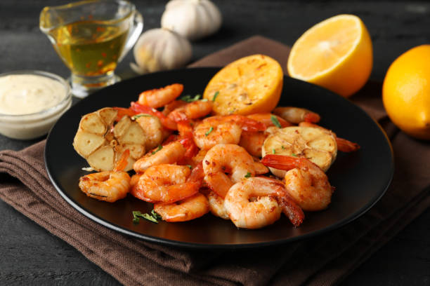 istock Composition with delicious shrimps on wooden background, close up 1207011694