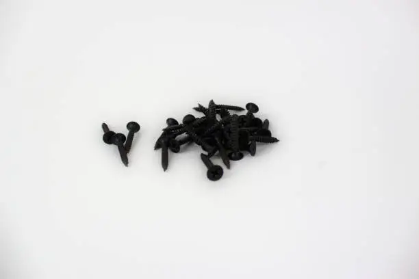 Self-driving black screws set isolated on white background