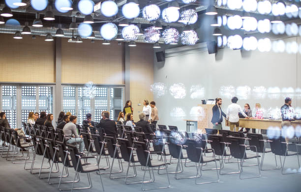istock Business people at a conference event 1207013982
