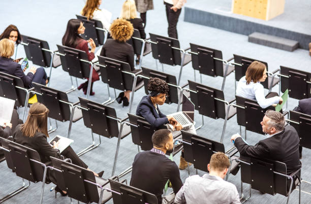 istock Business people at a conference event 1207014120