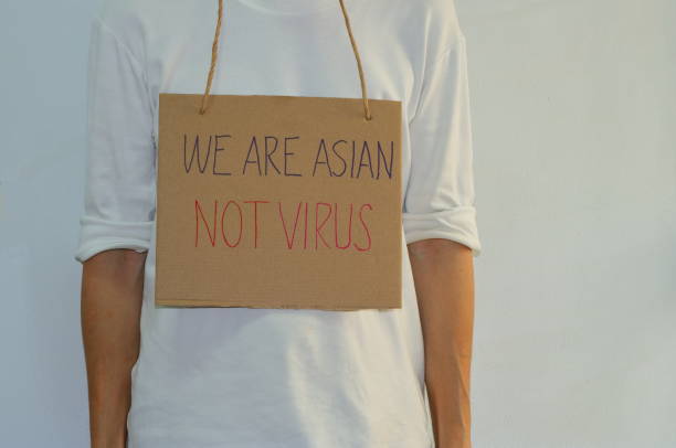 WE ARE ASIAN, NOT VIRUS stock photo
