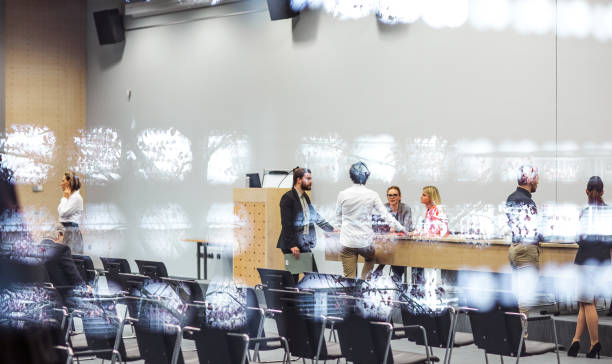 istock Business people at a conference event 1207015066