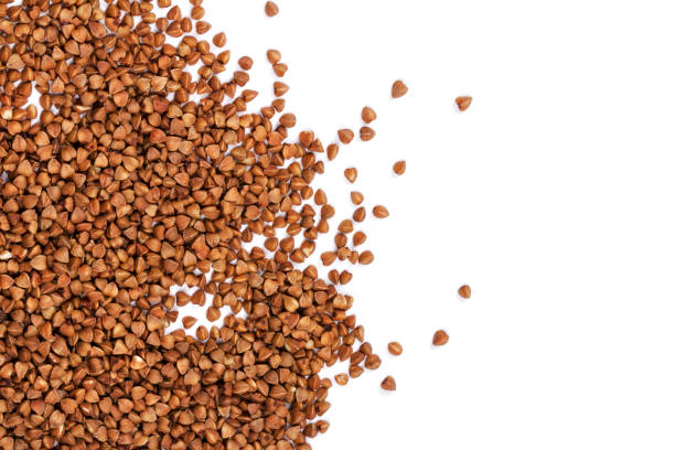 istock Buckwheat grain isolated on white background. close up 1207015322