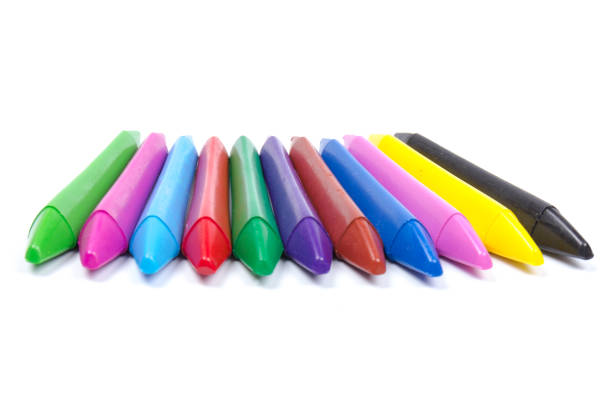 istock Colored wax pencils. A bunch on white background close-up 1207015351