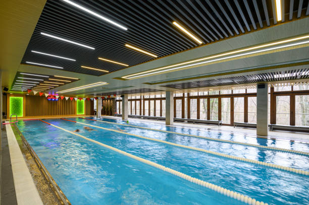 istock Luxury sportive indoor swimming pool with lanes interior 1207017722